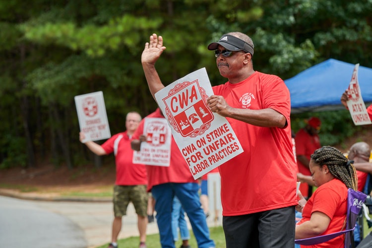 CWA union members at a past demonstration protesting AT&T.